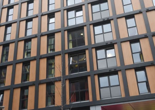 Removing cladding of the sort which had been used in Grenfell Tower - and in this student building - shouldn't be subject to VAT, according to housing minister Kevin Stewart.