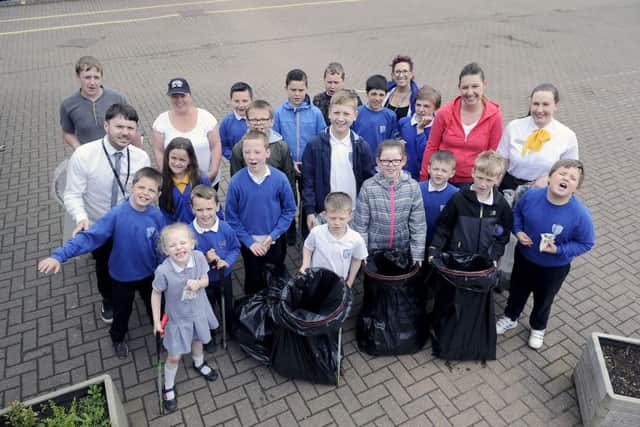 Victoria Primary School pupils and McDonald's staff take part in the eco litter pick