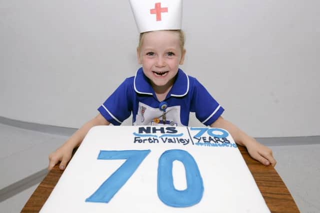 Five-year-old Freya McNab from Dunipace is keen to make an early start on her nursing career - and the cake!