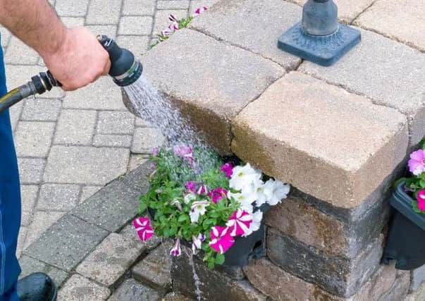 Why not use a watering can, says Scottish Water.