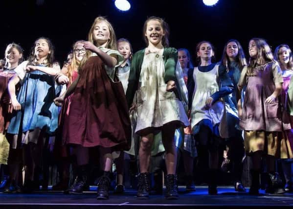 Annie production featuring Beattie family, mum Hazel and daughters April and Violet