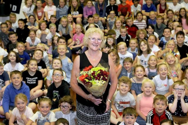 Principal teacher Mary Lockhart was given flowers for her retiral