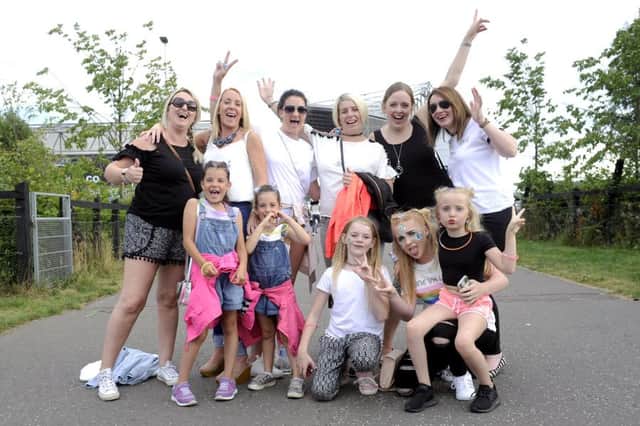 Fans captured outside the stadium before the gig