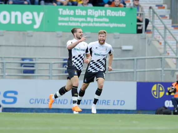 Inverness players celebrate their winner