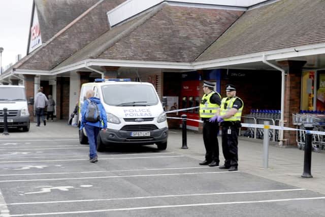 Officers also locked down the Falkirk Central Retail Park store after both were targeted in break-ins. Picture Michael Gillen