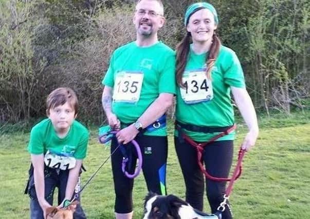 Jo McNally (right) will be supported by her husband, John, and son, Jacob