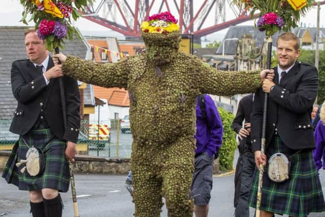 The Burryman takes to the streets of South Queensferry. Pic: SWNS