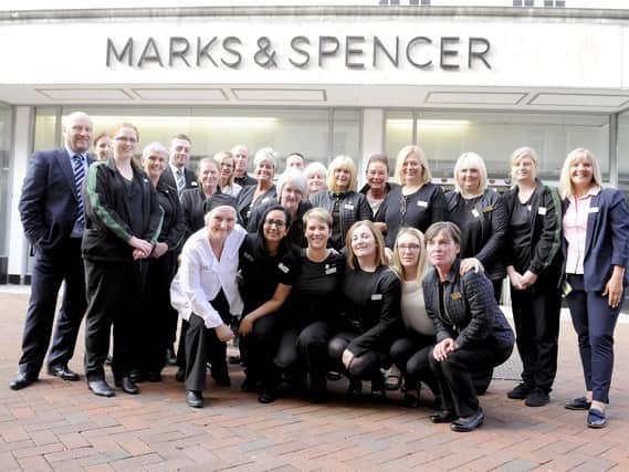 Staff marked the last day of trading. Picture Michael Gillen..