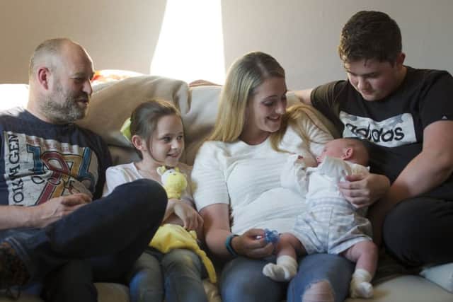 Falkirk couple Darren Burt and Mandy Niblo with children Nicole, Curtis and baby Harris.