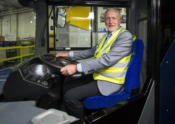 Jeremy Corbyn in the driving seat at Alexander Dennis coachbuilders in Camelon