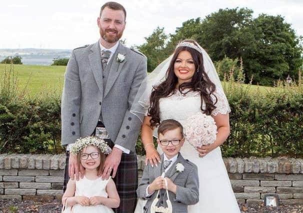 Robyn Dow (27) and Ross Goldie (27). Pic: Black and Comrie Weddings