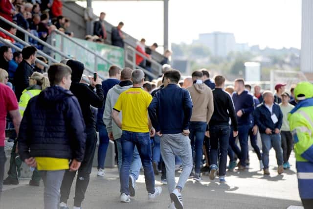 Fans took to social media to release their anger - but many aired their views audibly at the ground. Picture Michael Gillen.