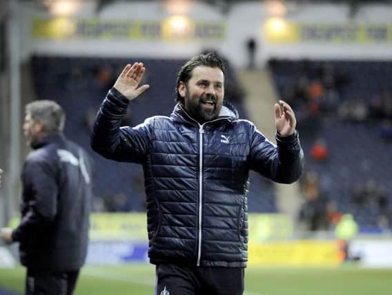 Happier times: Hartley after the 6-1 win against Dundee United