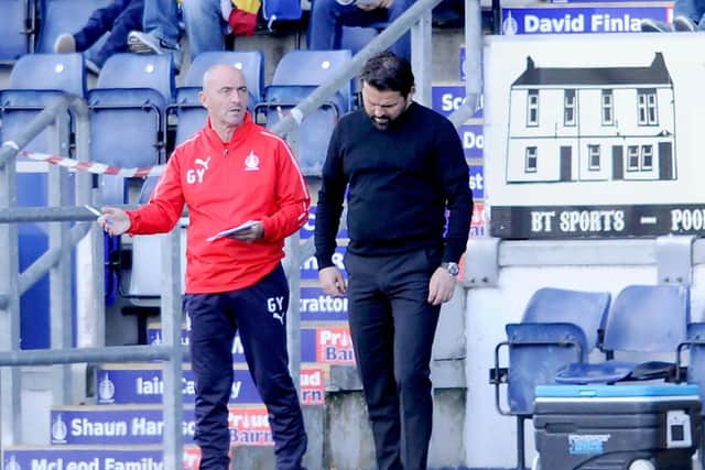 Hartley alongside Gordon Young