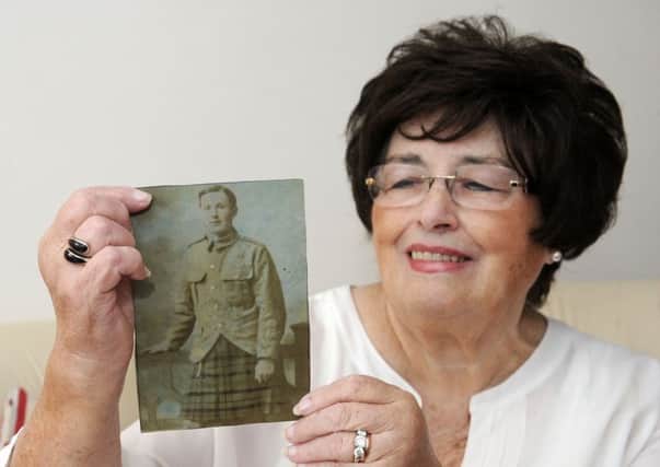 IIsobel Williams (81), with picture of her dad, William Dougall.