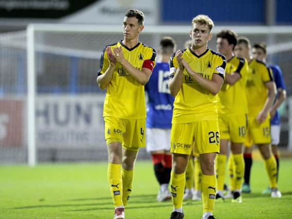 Falkirk players celebrate victory over Rangers Colts