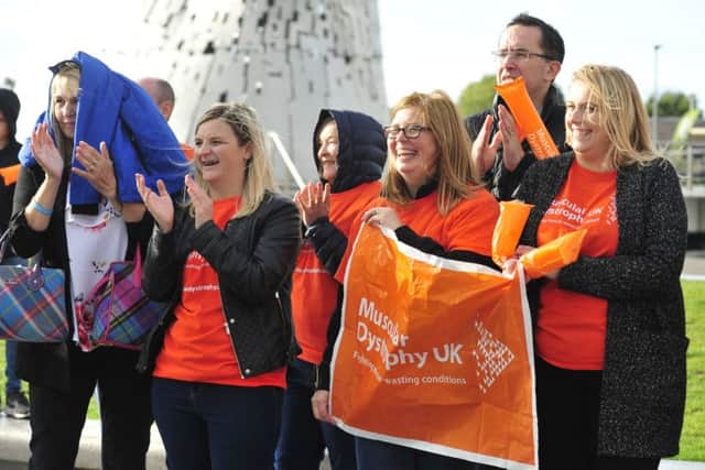 Crowds cheered on the cyclists as they arrived at the Kelpies