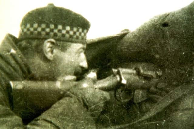 A captain of the Argylls, pictured sniping at the enemy while on duty in 1914.
