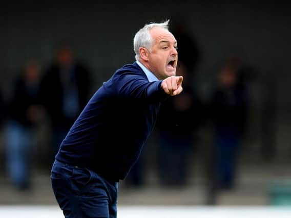 Ray McKinnon was taking charge of his first Championship fixture
