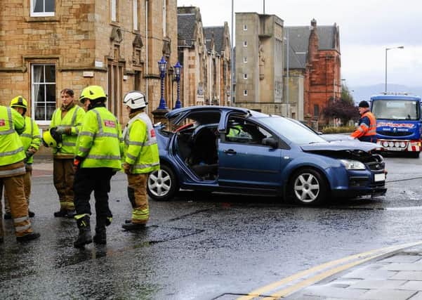Emergency services raced to the scene of the crash in Falkirk on Sunday morning. Pictures: Michael Gillen