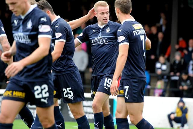Rudden is congratulated by Petravicius on his first Bairns goal