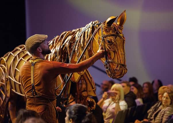 gratis editorial image...

The National Theatres acclaimed production of War Horse, based on the novel by Michael Morpurgo arrives at The SEC Armadillo from 15 January  2 February 2019 as part of a national tour.

Today (Friday 14th September 2018) Joey, the life-size equine puppet from War Horse made a special early appearance at the venue after performing in the SEC Centre to a specially invited audience.  The event also included a talk about the history of the show from War Horses Assistant Puppetry Director, Matthew Forbes.  The puppeteers operating Joey in Glasgow are Gareth Aled (Head), Michael Taibi (Heart) and Antony Antunes (Hind).