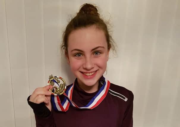 St Mungo's High pupil Niamh Glen, of Falkirk, raised over Â£700 for Strathcarron Hospice by swimming the Firth of Forth