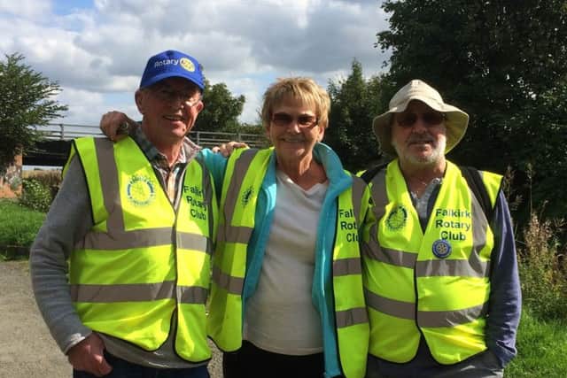 Nearing the end...with only one day of their walk left to go, the Rotary Club of Falkirk trio were all smiles! (L-r) Club secretary Sandy McGill, treasurer Linda Noble and president Jim Cairns on their 35 mile trek from the Kelpies to Bowling.