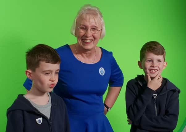 Ann MacFarlane with grandsons Marcus and Luke.