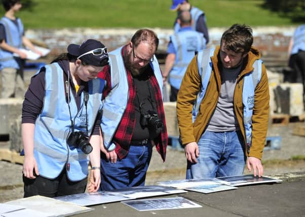 The IFLI team working on the Grangemouth clock project in Zetland Park last year.