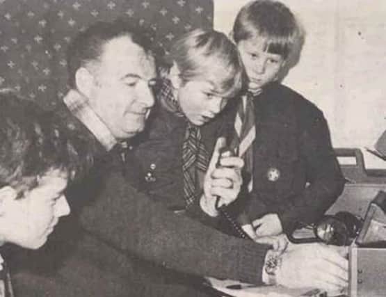 Mr Bill Wright from Larbert is pictured coaching local Scouts in radio broadcasting