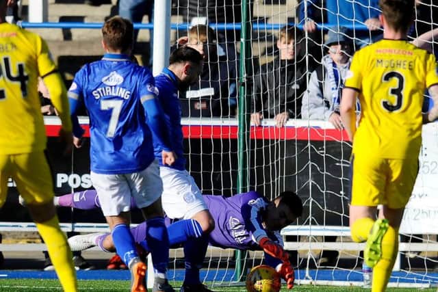 After pushing the ball onto the post, Mitchell pounced again and was fouled. Picture Michael Gillen