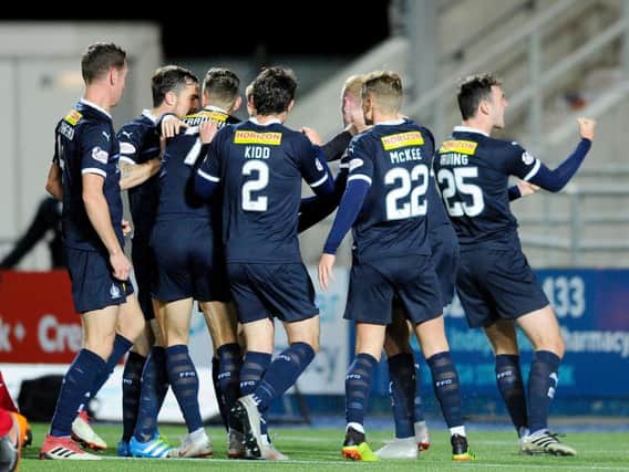 Falkirk players celebrate the opener. Picture: Michael Gillen.