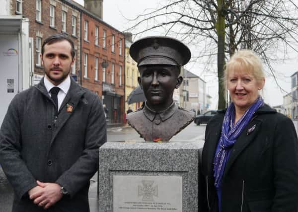 Denny artist Helen Runciman is pictured with the sculpture of Private William McFadzean and the First World War Hero's great-great-nephew Jack