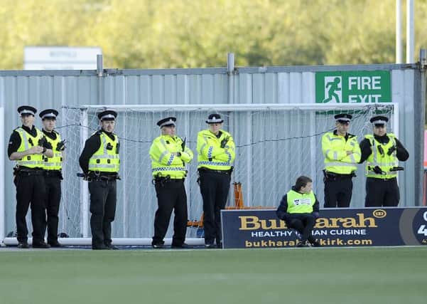 Police have arrested a man in connection with an incident during a match between Falkirk and Dunfermline. Picture: Michael Gillen