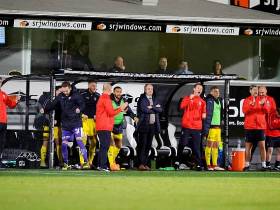 The Falkirk bench celebrated Andrew Dallas' final whistle. Picture: Michael Gillen.