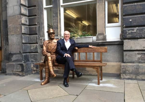 Archie Mackay pictured at the memorial bench dedicated to General Stanislaw Maczek