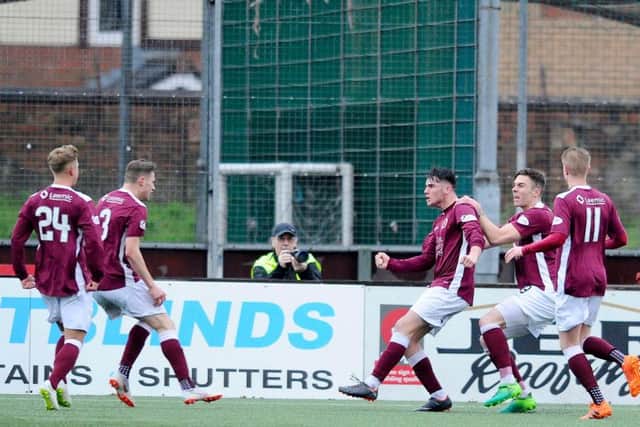 Conor McBrearty celebrates as Stenhousemuir dumps local rivals Falkirk out of the Cup (pic: Michael Gillen)