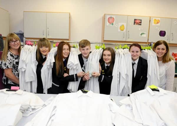 Denny High School pupils have set up a clothing bank for fellow students.