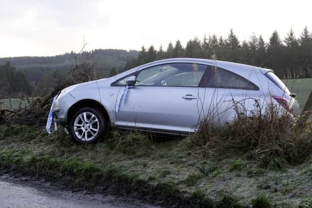 The car was left stuck in a hedge in Lochgreen Road, Falkirk. Pictures: Michael Gillen