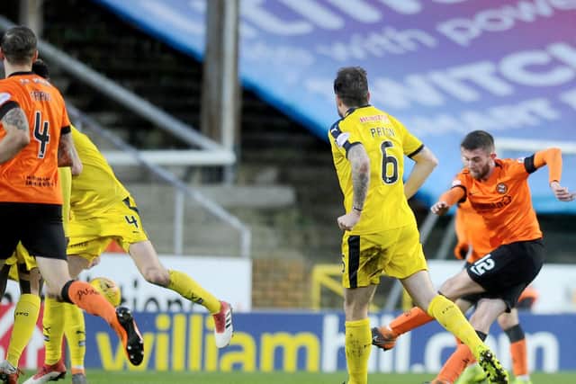 Dundee United's opener, which deflected off of Aaron Muirhead
