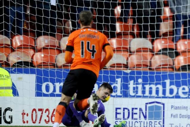 Mitchell was left helpless by a deflected strike which gave Dundee United the lead