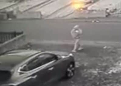 CCTV captured a vandal attempting to smash a car window in Muirfield Road in Stenhousemuir