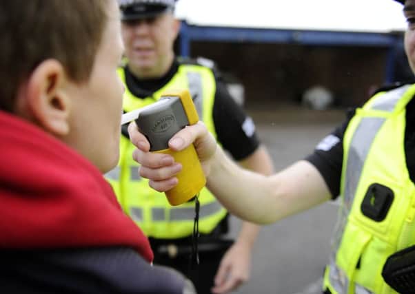 Police stopped a taxi driver in Falkirk who was three times over the drink-drive limit