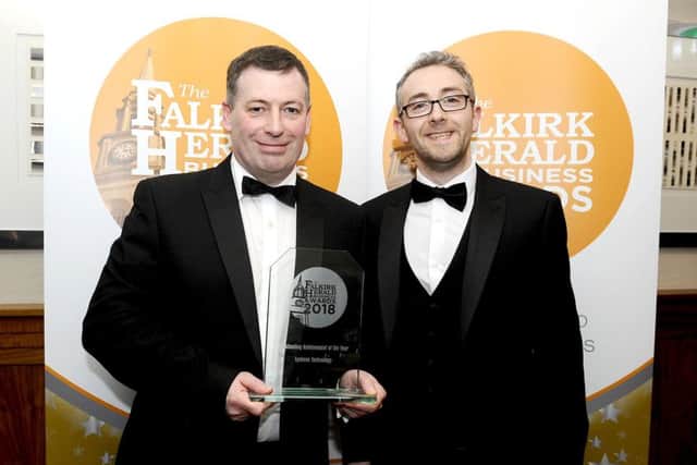 Anthony Clarkson (left) and David Mahon, of Lynkeos, with the awards