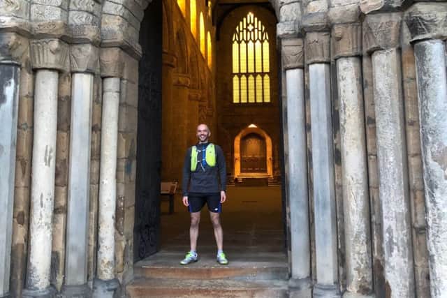 Dr Mark Calder set off from Dunfermline Abbey on the first of 14 ultramarathons this year during which he hopes to raise £50,000 to help refugees return to their homes in northern Iraq.