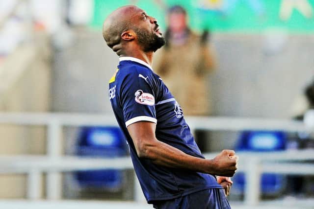William Edjenguele celebrates his debut goal for Falkirk (Pic by Michael Gillen)