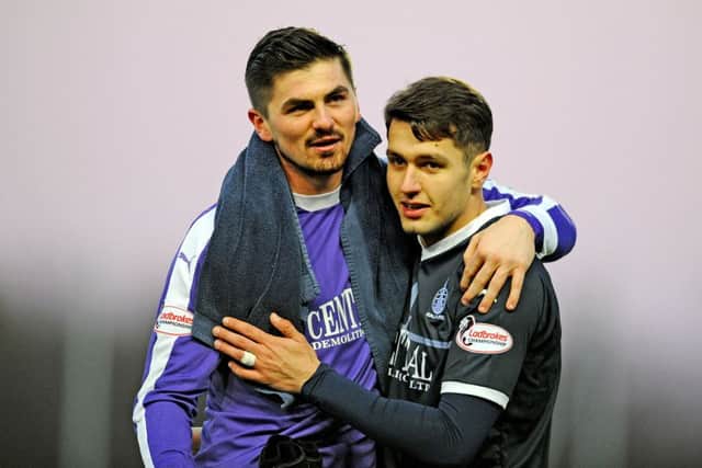 Nikolay Todorov with goalkeeper Harry Burgoyne. Picture Michael Gillen.
