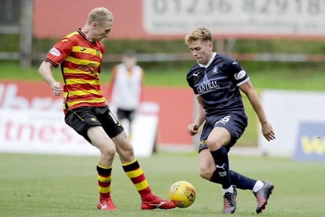 McKinnon doesnt seem to be a fan. Released him from Morton in the summer and when he arrived at Falkirk Russell was on borrowed time until his release in January. Picture: Michael Gillen.
