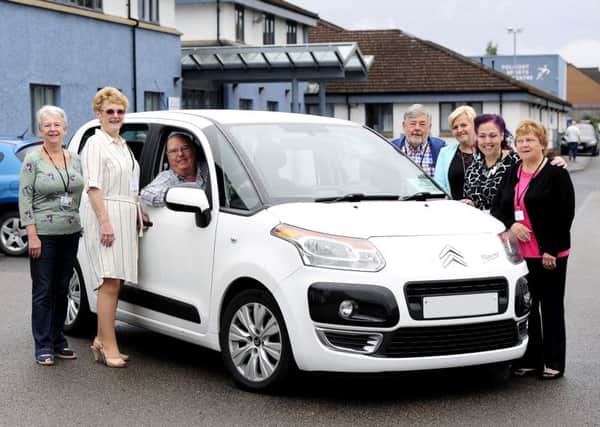 Meadowbank Car 4U chairwoman Anne McDonald (second from left) pictured with volunteers from the charity